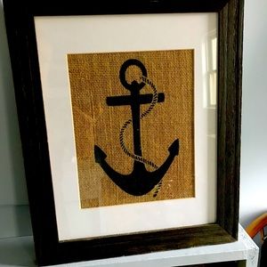 Framed picture. Blue anchor.